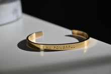 Load image into Gallery viewer, &quot;I AM POWERFUL&quot; Affirmation engraved in gold tarnish resistant cuffed bracelet (bendable)
